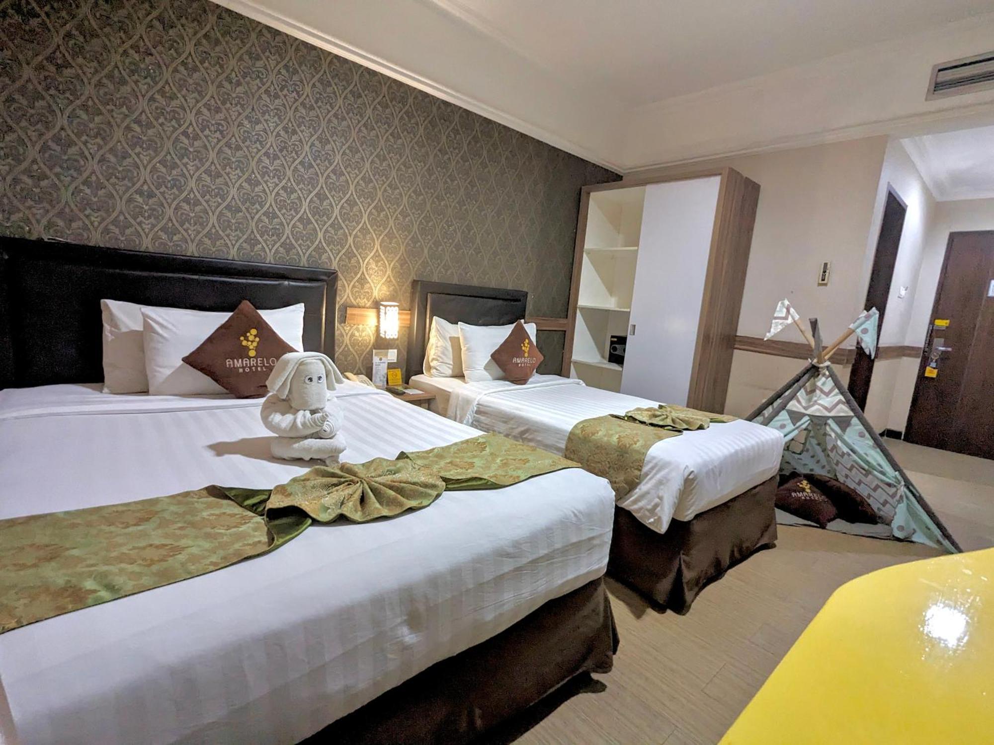 Amarelo Hotel Solo Extérieur photo