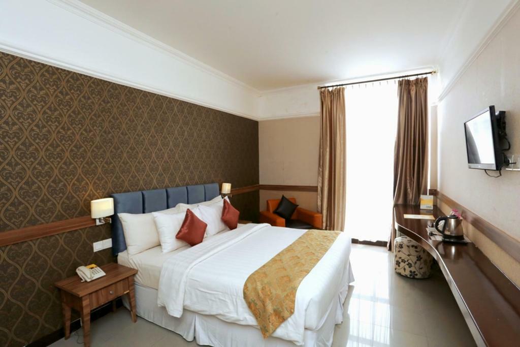 Amarelo Hotel Solo Extérieur photo