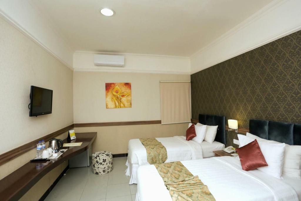 Amarelo Hotel Solo Extérieur photo